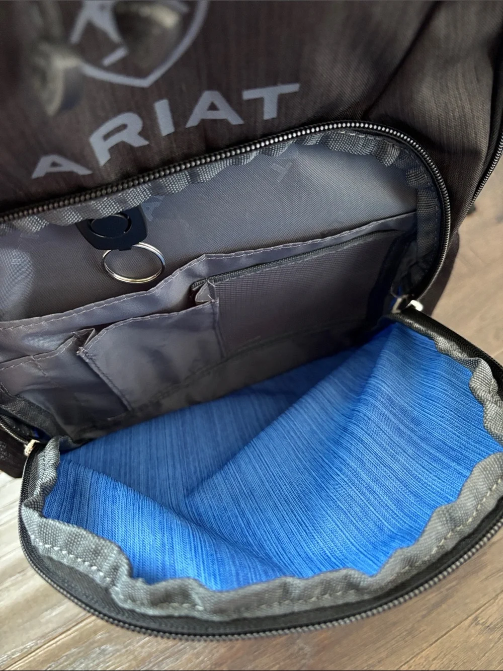 Ariat Logo Backpack,3 zipper compartments,organization slots,bottle holders